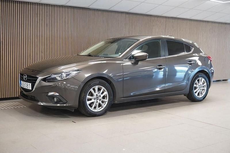 Brun Begagnad 2013 Mazda 3 Inclusive Halvkombi | 99 700 kr (Marknadspris) - Bild 1/4