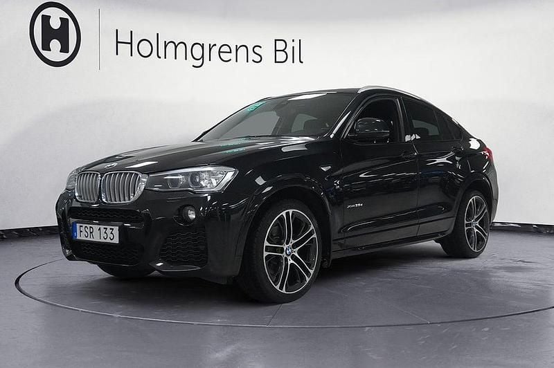 Svart Begagnad 2015 BMW X4 M Sport SUV | 249 800 kr (Marknadspris) - Bild 1/4