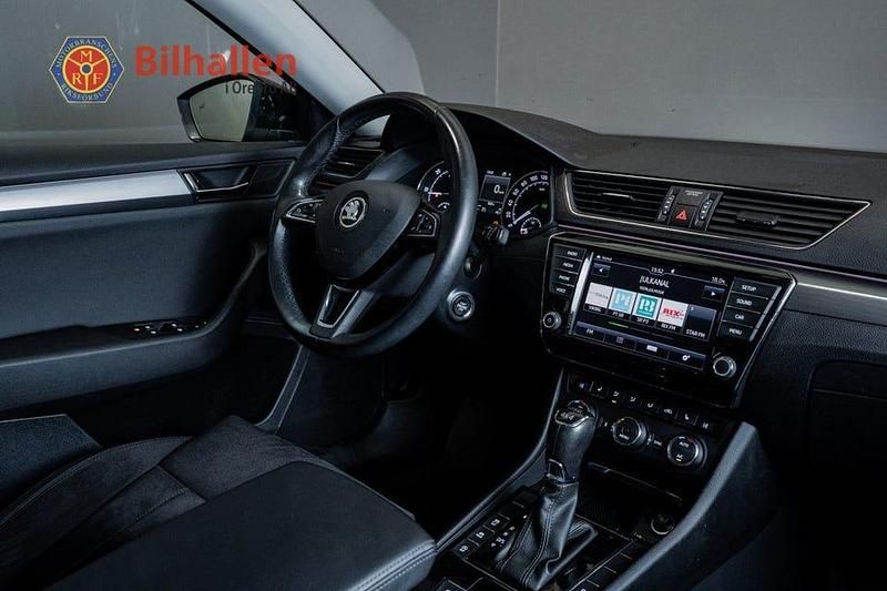 Begagnad Skoda Superb Business Line 190 HK (139 kW) 2016 Brun Kombi