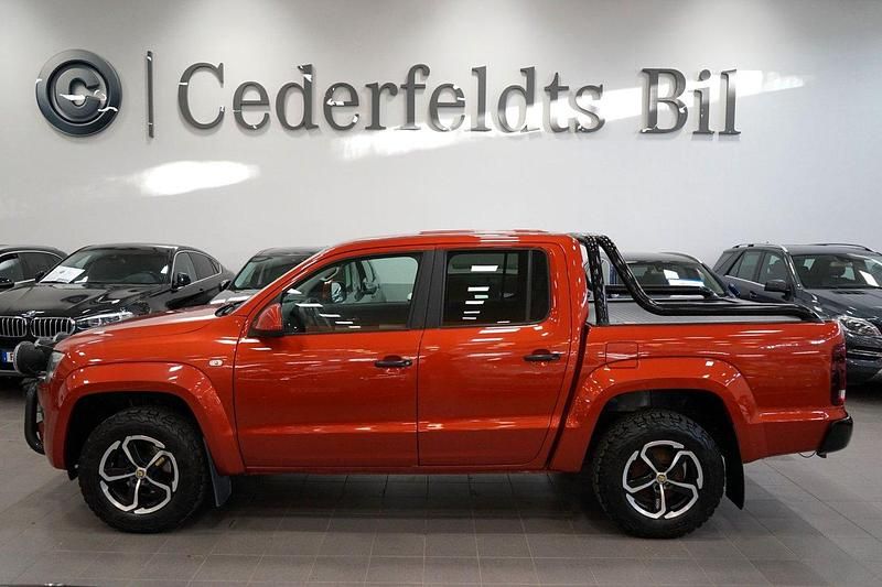 Ljusröd (röd) Begagnad 2014 VW Amarok Canyon Pickup | 219 900 kr (Marknadspris) - Bild 1/4