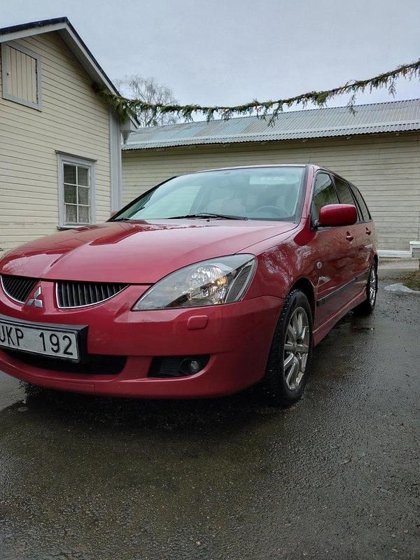 Röd Begagnad 2004 Mitsubishi Lancer Kombi | 8 000 kr (Bra pris) - Bild 1/4