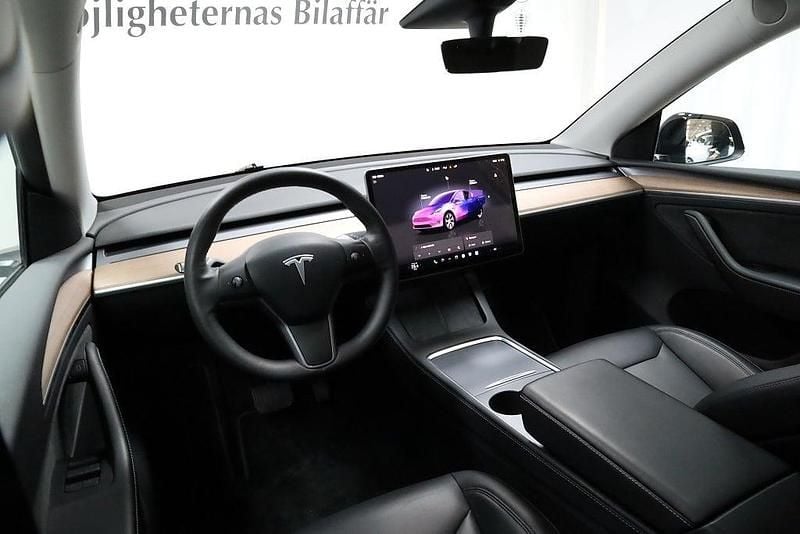 Begagnad Tesla Model Y Long Range AWD 378 kW (514 HK) 2023 Svart SUV
