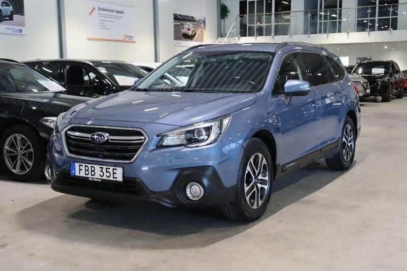Ljusblå Begagnad 2018 Subaru Outback Active SUV | 174 900 kr (Marknadspris) - Bild 1/4