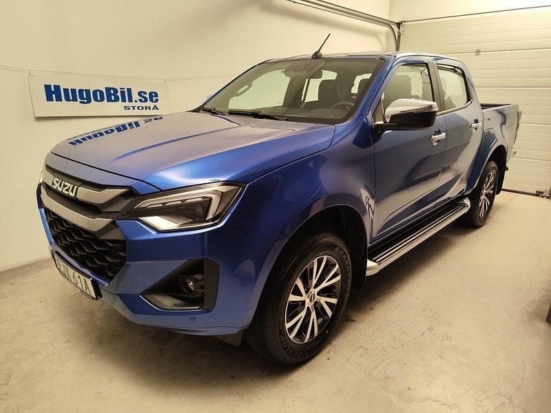Blå (biarritz blue metallic) Ny 2025 Isuzu D-Max Van | 636 250 kr - Bild 1/4