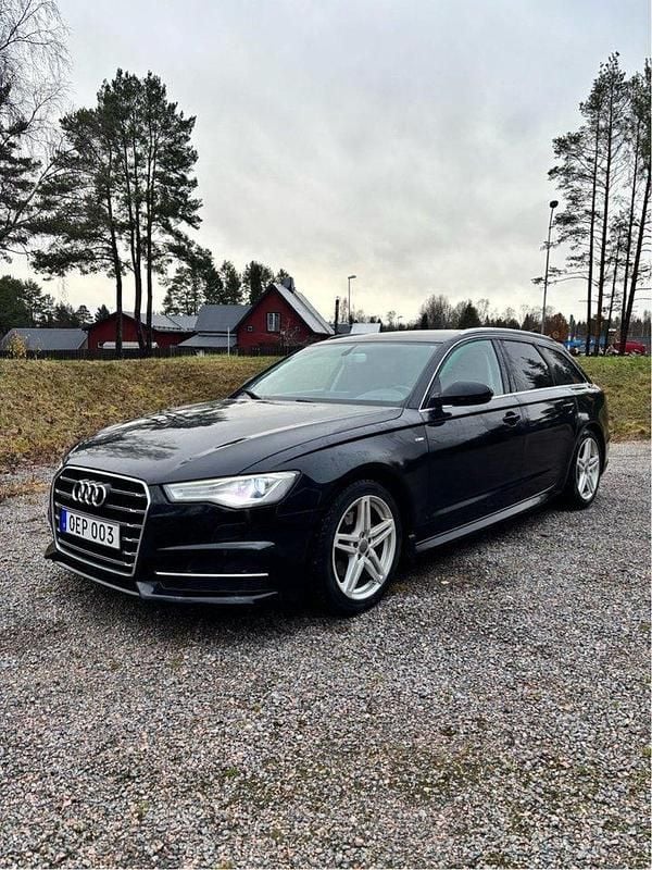Svart Begagnad 2017 Audi A6 Ambition Kombi | 170 000 kr (Marknadspris) - Bild 1/4