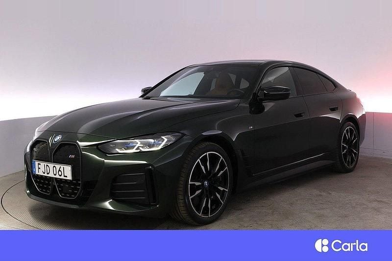 Grön Begagnad 2022 BMW i4 M Sport Sedan | 504 900 kr (Bra pris) - Bild 1/4
