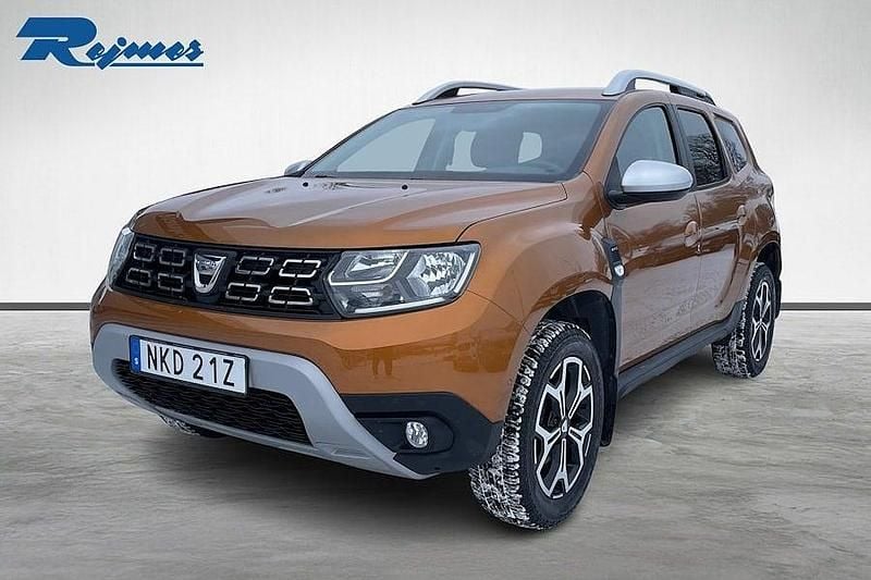 Bronze metallic Begagnad 2019 Dacia Duster Prestige SUV | 179 800 kr (Marknadspris) - Bild 1/4