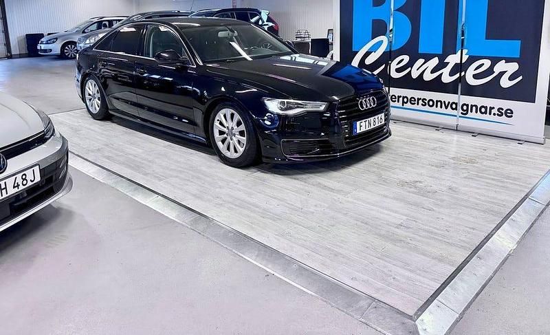 Svart Begagnad 2015 Audi A6 Sport Sedan | 135 000 kr (Bra pris) - Bild 1/4