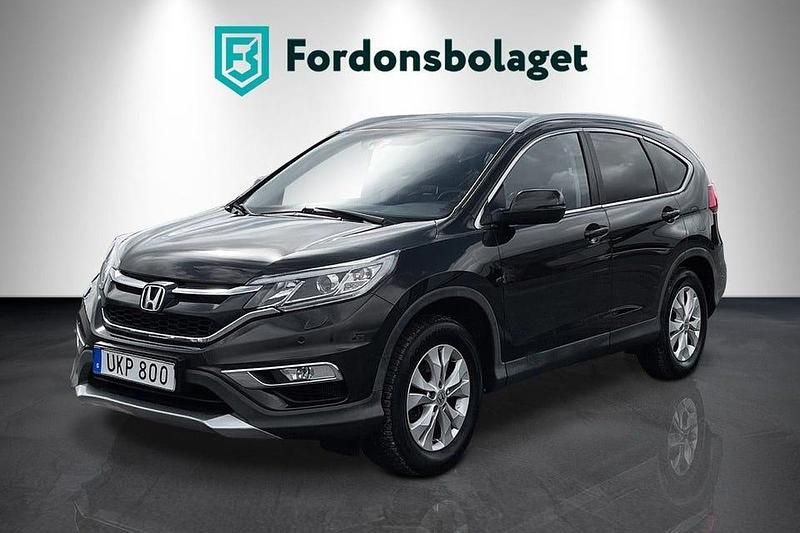 Mörkbrun (brun) Begagnad 2015 Honda CR-V Executive SUV | 154 900 kr (Marknadspris) - Bild 1/4
