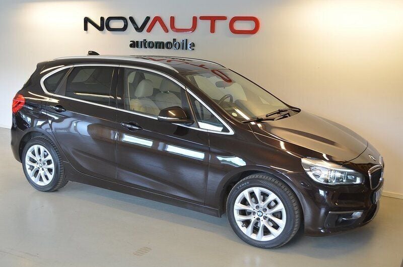 Sparkling brown metallic Begagnad 2014 BMW 218 Luxury Line Kombi | 169 900 kr (Marknadspris) - Bild 1/4
