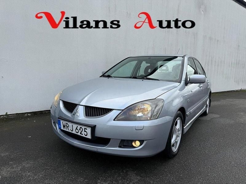 Silver Begagnad 2005 Mitsubishi Lancer Sedan | 21 900 kr (Marknadspris) - Bild 1/4