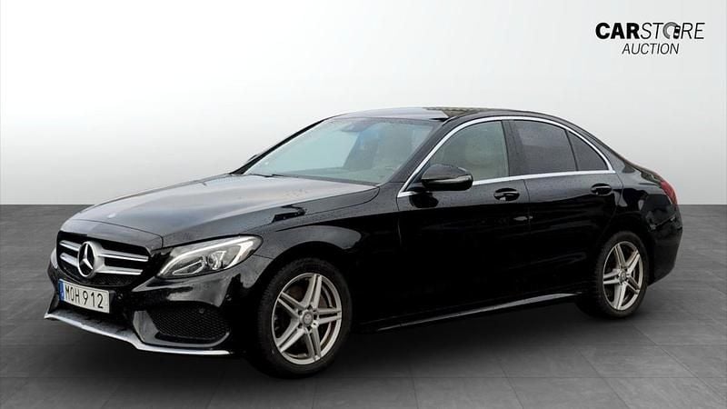 Svart (black) Begagnad 2015 Mercedes C220 AMG line Sedan | 189 900 kr (Marknadspris) - Bild 1/4
