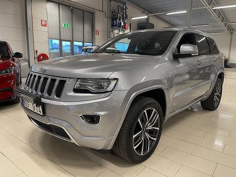 Grå Begagnad 2014 Jeep Grand Cherokee SUV | 219 000 kr (Marknadspris) - Bild 1/4