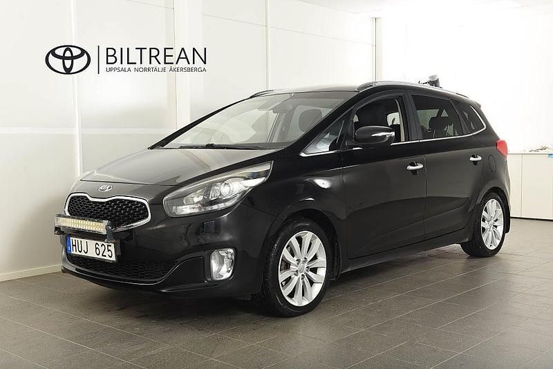 Svart Begagnad 2013 Kia Carens Minibuss | 89 900 kr (Marknadspris) - Bild 1/4