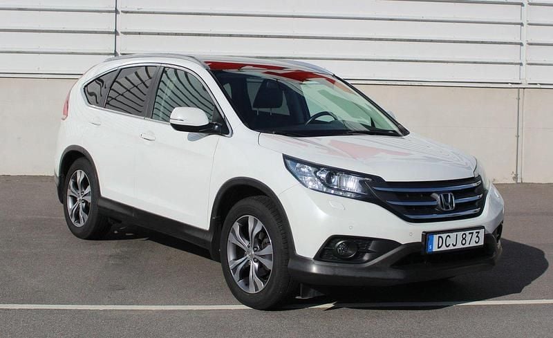 Vit Begagnad 2014 Honda CR-V Executive SUV | 184 500 kr (Marknadspris) - Bild 1/4