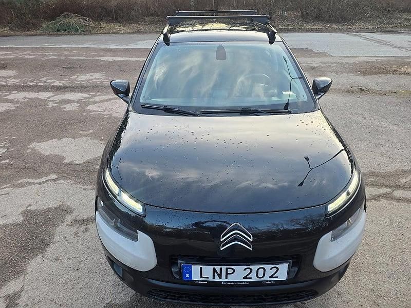 Begagnad Citroën C4 Cactus PureTech 82 HK (60 kW) 2014 Svart Halvkombi