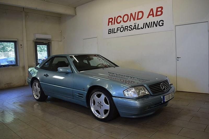Ljusblå Begagnad 1996 Mercedes SL320 Cab | 179 900 kr - Bild 1/4
