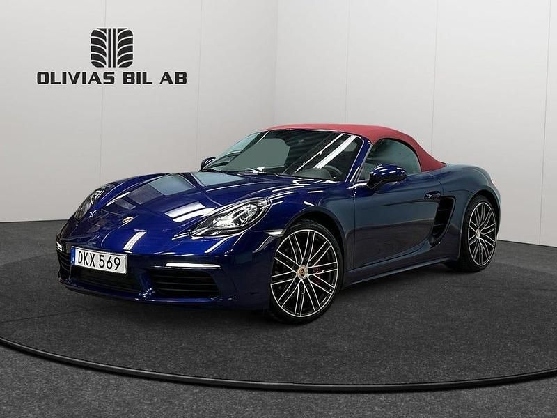 Flerfärgad (blå) Begagnad 2022 Porsche 718 Boxster S Cab | 799 400 kr - Bild 1/4