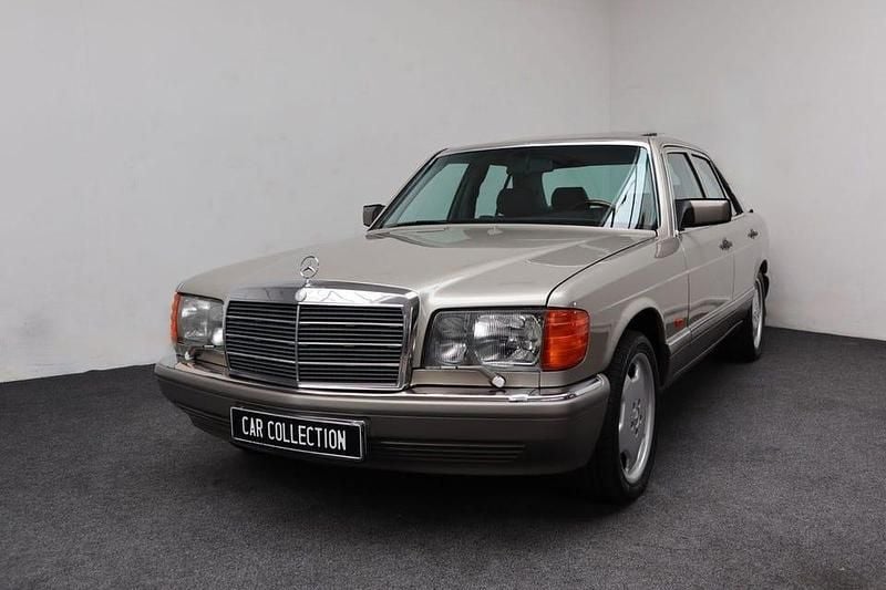 Grå Begagnad 1987 Mercedes 300 SE Sedan | 159 900 kr - Bild 1/4