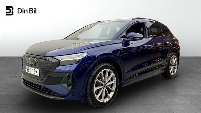 Navarrablå metallic Begagnad 2024 Audi Q4 e-tron Advanced Plus SUV | 634 900 kr - Bild 1/4