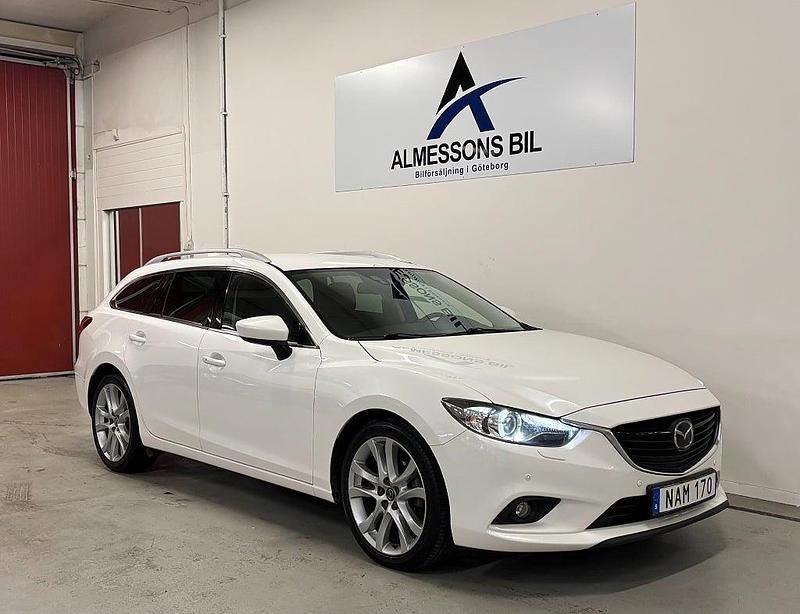 Begagnad Mazda 6 Optimum 175 HK (128 kW) 2013 Vit Kombi