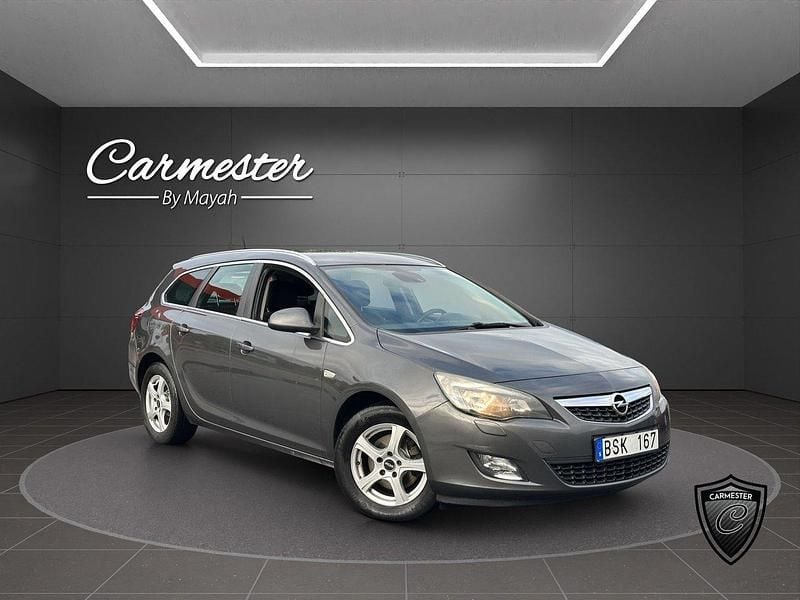 Grå Begagnad 2012 Opel Astra Enjoy Kombi | 49 990 kr (Marknadspris) - Bild 1/4