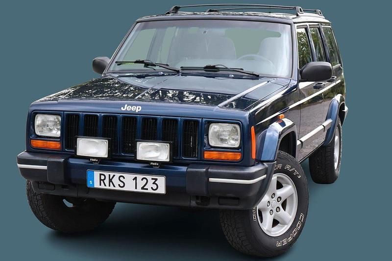 Blå Begagnad 2000 Jeep Cherokee Sport SUV | 115 000 kr (Marknadspris) - Bild 1/4