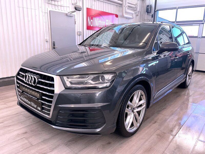 Grå Begagnad 2015 Audi Q7 S-Line SUV | 299 900 kr - Bild 1/4