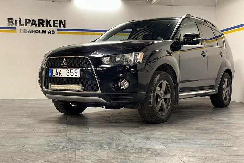 Svart Begagnad 2012 Mitsubishi Outlander Comfort Edition SUV | 99 900 kr (Marknadspris) - Bild 1/4