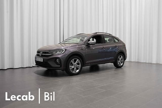 Grå (smokey grey metallic) Begagnad 2022 VW Taigo R-line SUV | 219 500 kr (Marknadspris) - Bild 1/4