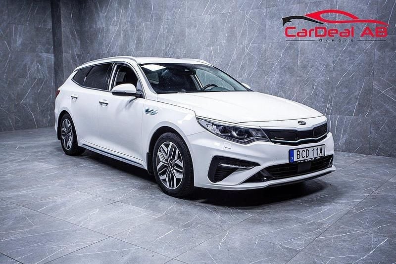 Vit Begagnad 2019 Kia Optima Hybrid Advance Sedan | 149 800 kr (Marknadspris) - Bild 1/4