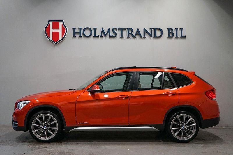 Orange Begagnad 2012 BMW X1 xLine SUV | 169 900 kr (Dyr) - Bild 1/4