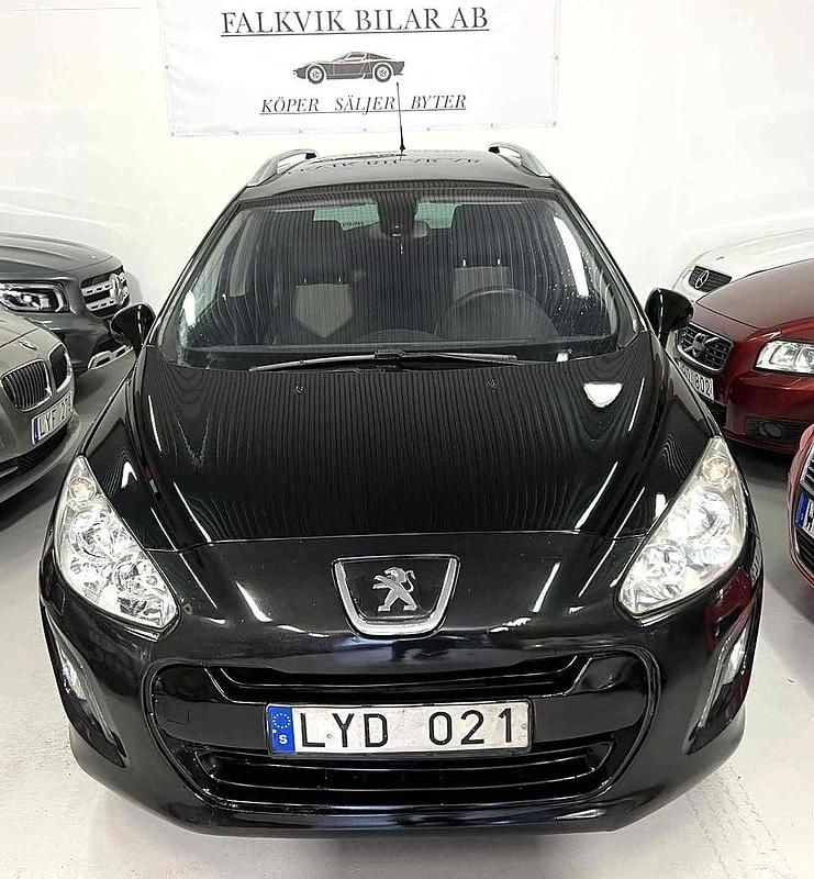 Svart Begagnad 2011 Peugeot 308 SW Kombi | 30 899 kr (Marknadspris) - Bild 1/4