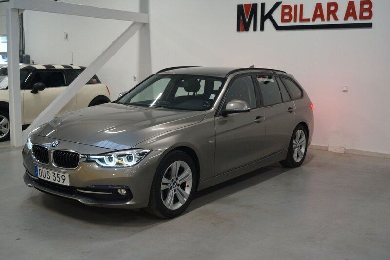 Grå Begagnad 2016 BMW 318 Sport Line Kombi | 174 900 kr (Marknadspris) - Bild 1/4