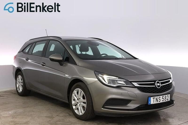 Grå Begagnad 2016 Opel Astra Enjoy Kombi | 89 900 kr (Marknadspris) - Bild 1/4
