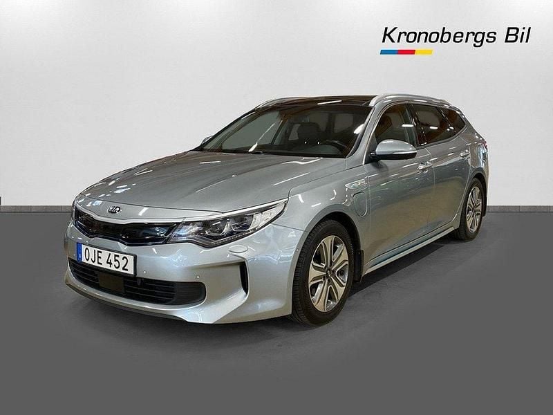 Grå Begagnad 2018 Kia Optima Hybrid 2 Sedan | 157 500 kr (Marknadspris) - Bild 1/4