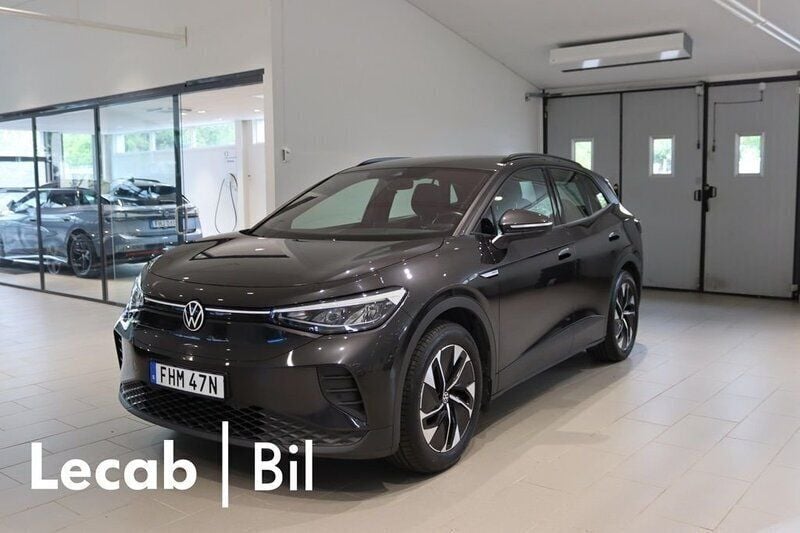 Mörkgrå (mangan grey metallic) Begagnad 2022 VW ID.4 Pro Performance SUV | 294 500 kr (Marknadspris) - Bild 1/4