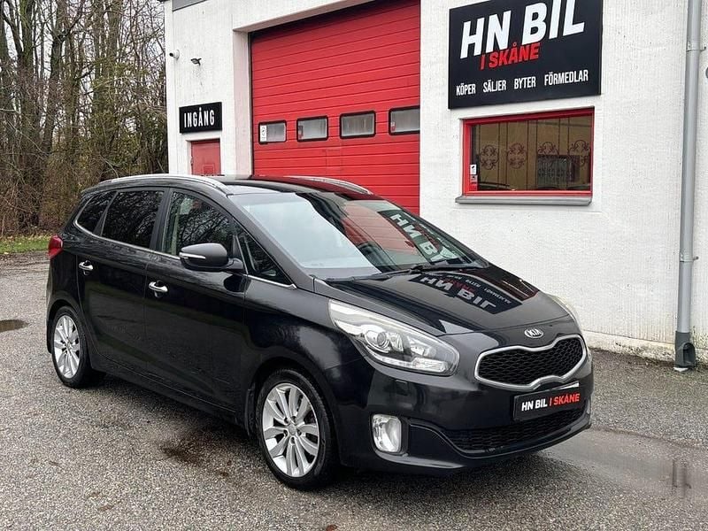Svart Begagnad 2014 Kia Carens Minibuss | 54 900 kr (Marknadspris) - Bild 1/4