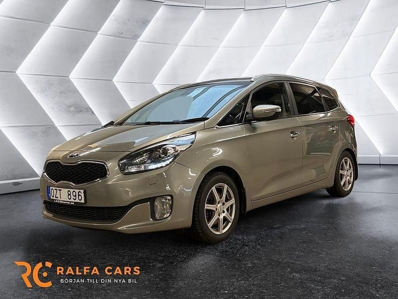 Grå Begagnad 2013 Kia Carens Minibuss | 84 900 kr (Marknadspris) - Bild 1/3