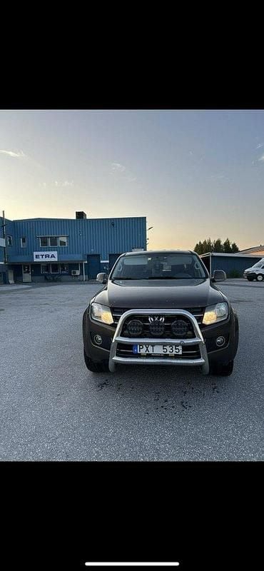 Brun Begagnad 2011 VW Amarok Highline Pickup | 80 000 kr (Marknadspris) - Bild 1/4