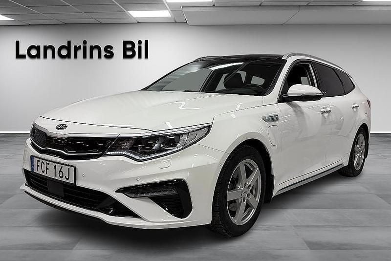 Vit Begagnad 2020 Kia Optima Hybrid Plus Sedan | 209 300 kr (Bra pris) - Bild 1/4