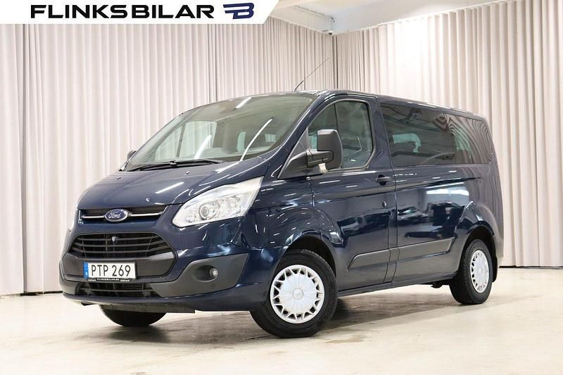 Blå Begagnad 2014 Ford Transit Custom Kombi | 179 900 kr (Marknadspris) - Bild 1/4