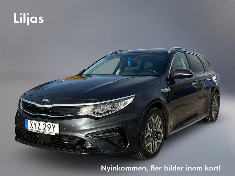 Grå Begagnad 2018 Kia Optima Hybrid Advance Sedan | 214 000 kr (Marknadspris) - Bild 1/4