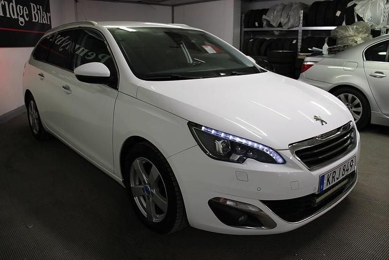 Begagnad Peugeot 308 SW Allure 150 HK (110 kW) 2014 Vit Kombi