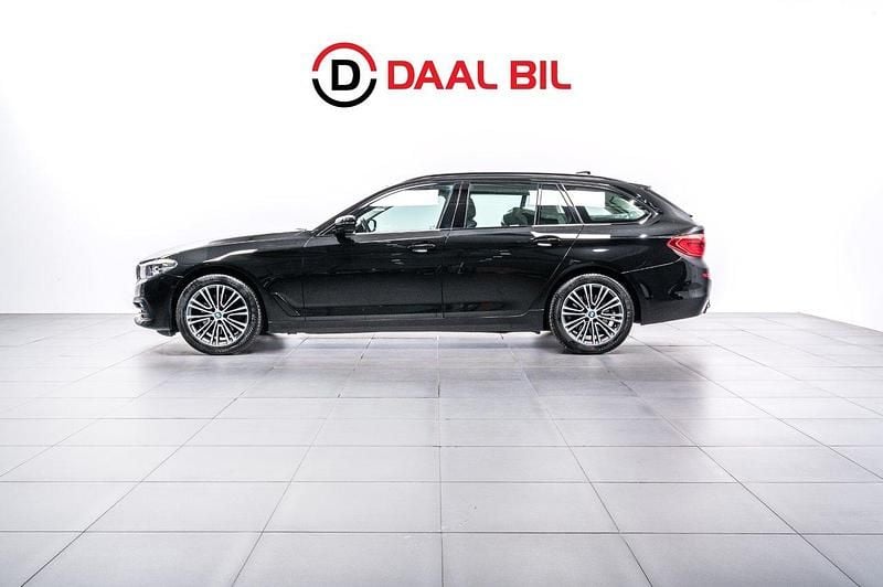 Svart Begagnad 2020 BMW 520 Sport Line Kombi | 249 700 kr (Bra pris) - Bild 1/4