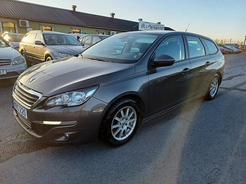 Grå Begagnad 2014 Peugeot 308 SW Active Kombi | 59 900 kr (Marknadspris) - Bild 1/4