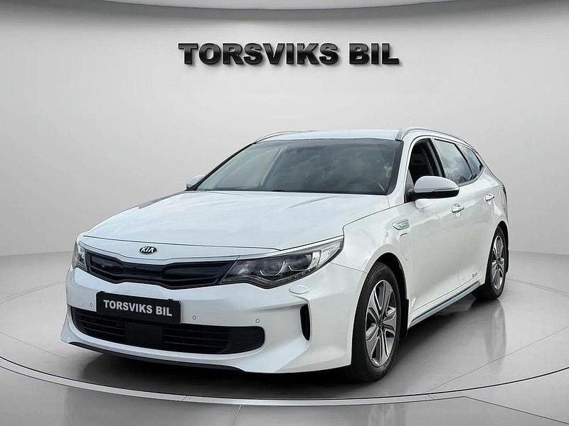 Vit Begagnad 2018 Kia Optima Hybrid 2 Sedan | 154 900 kr (Marknadspris) - Bild 1/4