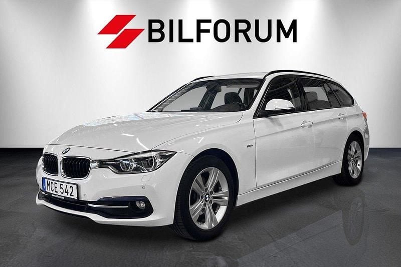 Vit Begagnad 2015 BMW 320 Sport Line Kombi | 178 700 kr (Bra pris) - Bild 1/4