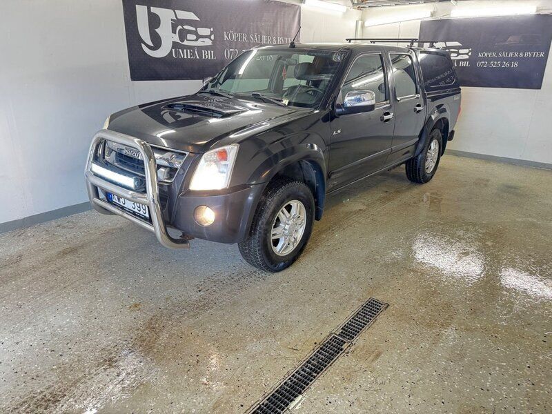 Svart Begagnad 2010 Isuzu D-Max Pickup | 89 900 kr (Marknadspris) - Bild 1/4