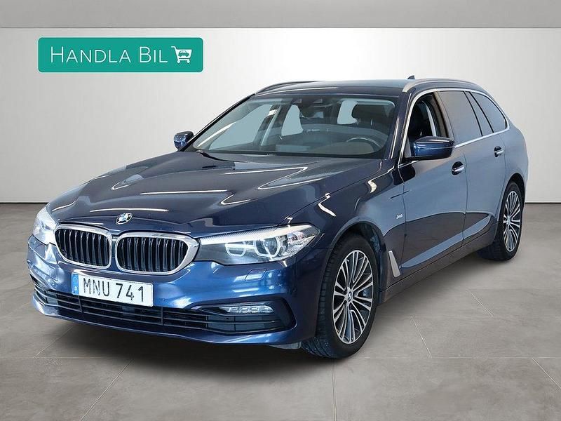 Blå Begagnad 2017 BMW 520 Sport Line Kombi | 239 900 kr (Marknadspris) - Bild 1/4